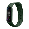 kwmobile Silikon Uhrenarmband für Xiaomi Mi Smart Band 6 / Mi Band 6 / Band 5 Armband - Ersatzarmband für Fitnesstracker - Wechselarmband Smartwatch - Dunkelgrün Dunkelgrün  